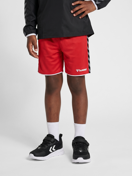 hmlAUTHENTIC KIDS POLY SHORTS, TRUE RED, model