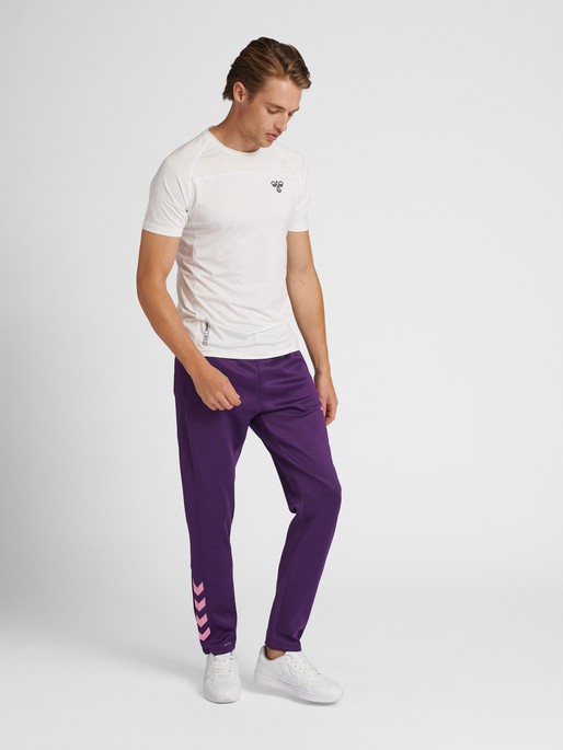 hmlCORE XK POLY PANTS, ACAI, model