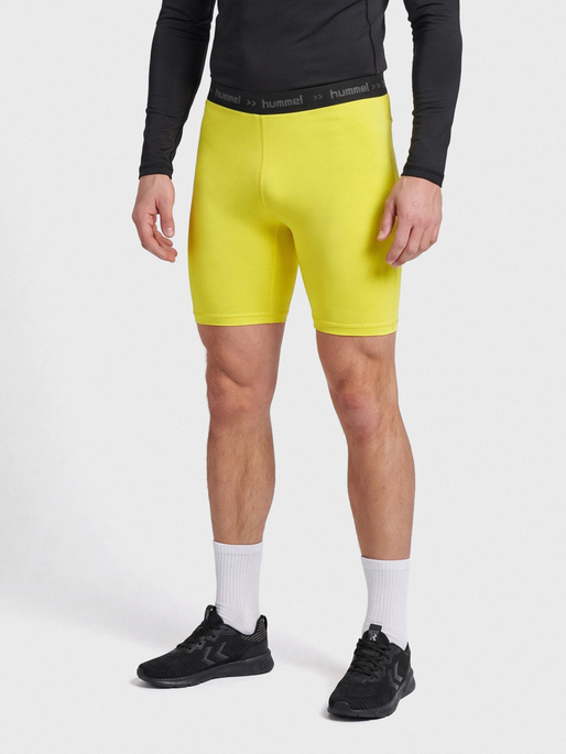 HML FIRST PERFORMANCE TIGHT SHORTS, BLAZING YELLOW, model