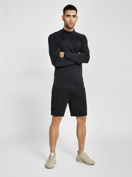 hmlSTROKE SEAMLESS HALF ZIP, BLACK, model