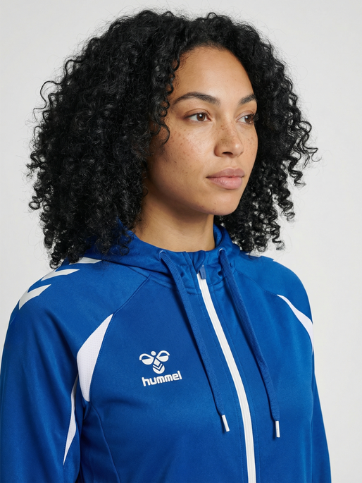 hmlCORE 2.0 ZIP HOODIE WOMAN, TRUE BLUE/WHITE, model
