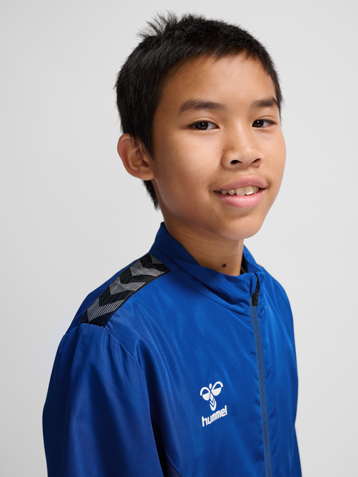 hmlAUTHENTIC PL ZIP HOODIE KIDS, TRUE BLUE, model