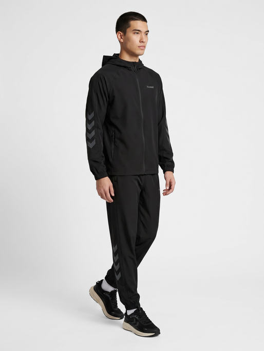 hmlHYBRID TRACK PANTS, BLACK, model